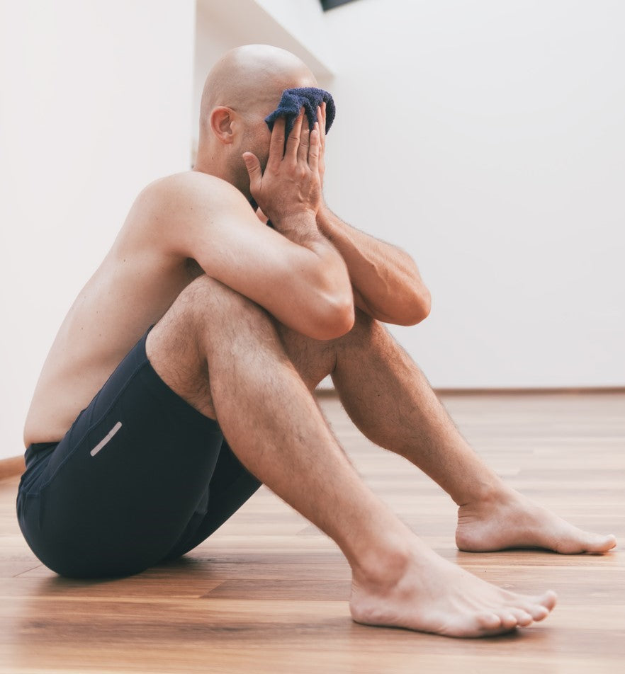 Man with prostate cancer sweating from a hormonal hot flash